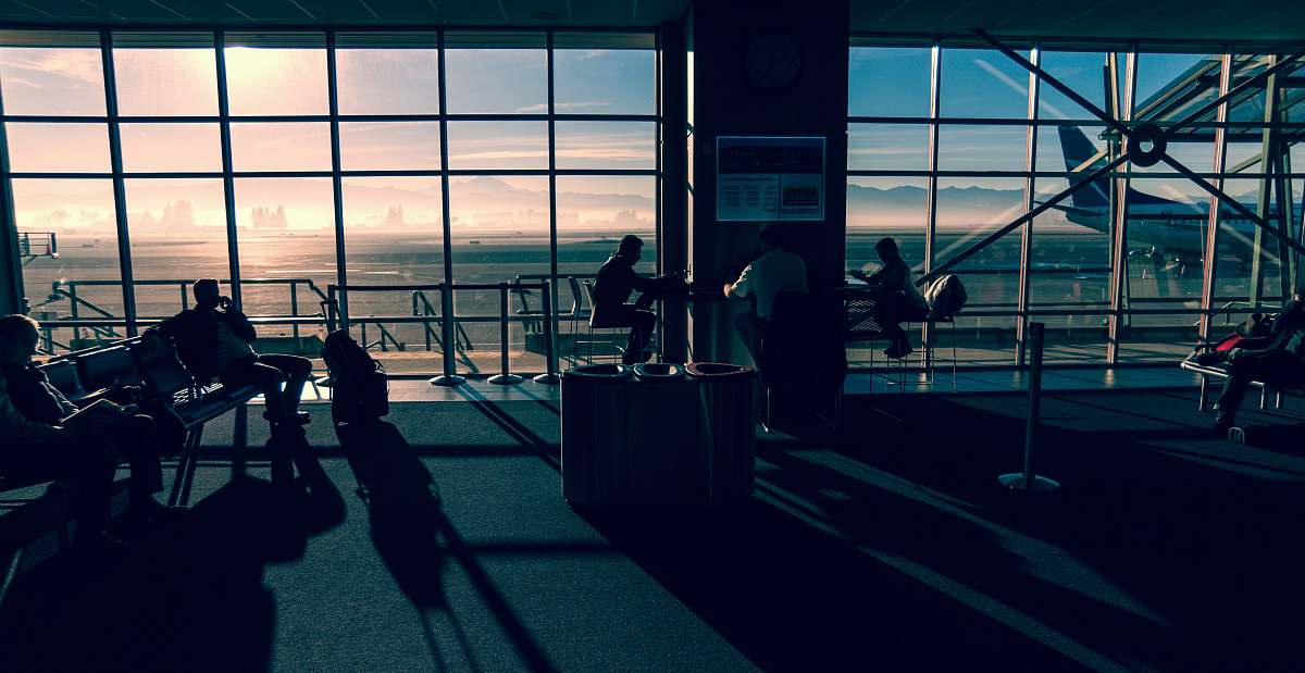 terminal people sitting on lobby near airport runway during daytime abbotsford